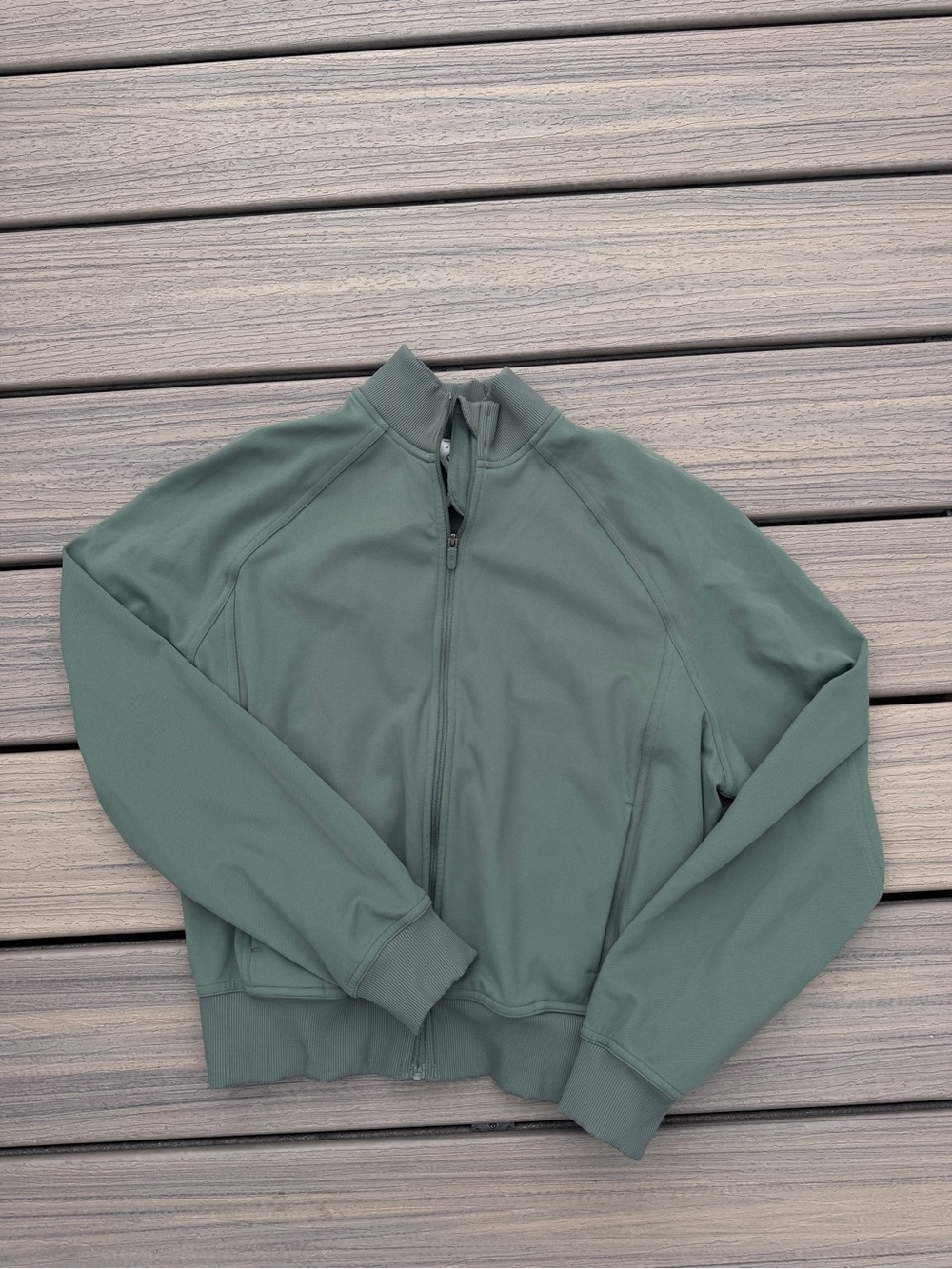 like new! Lululemon athletica Wunder Train Track Jacket in Dark Forest Green